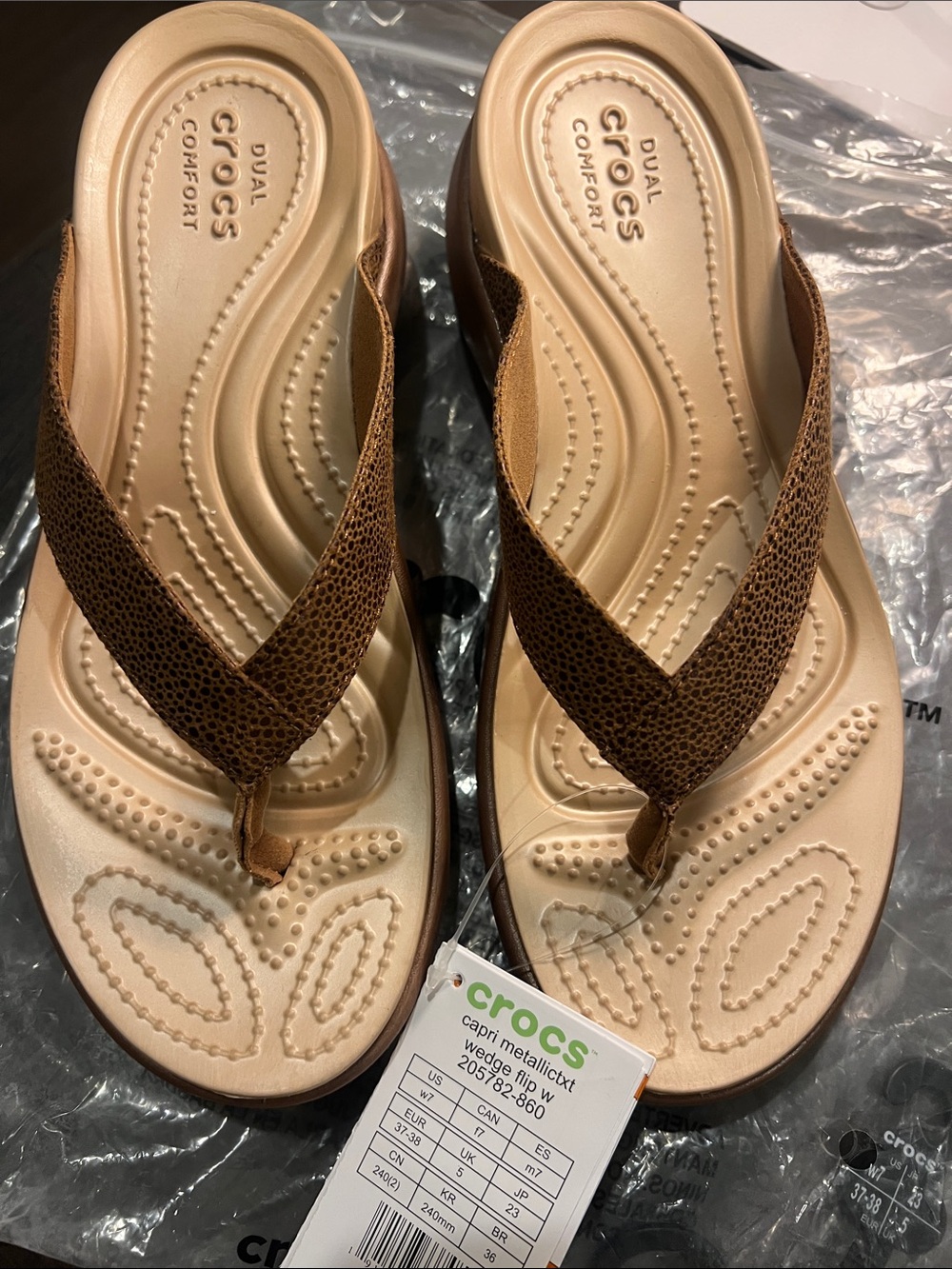 CROCS Women’s Capri Metallic V-Twist Sandal in Tan and Brown